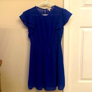 Royal blue dress. Polyester fabric travels well and stays wrinkle free. Lined.
